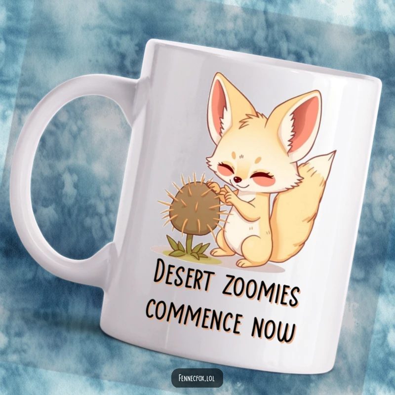 Funny Fennec Fox mug mid-play, comically batting a rolling tumbleweed across a sandy desert landscape.