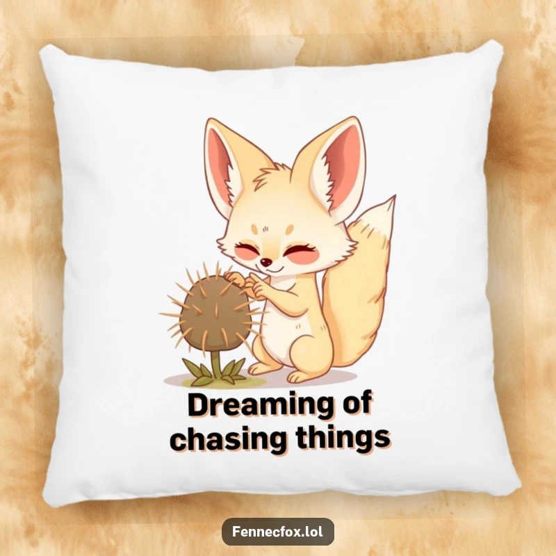 Funny Fennec Fox pillow showing a playful fox batting a fluffy tumbleweed, ideal for cozy, humorous decor.
