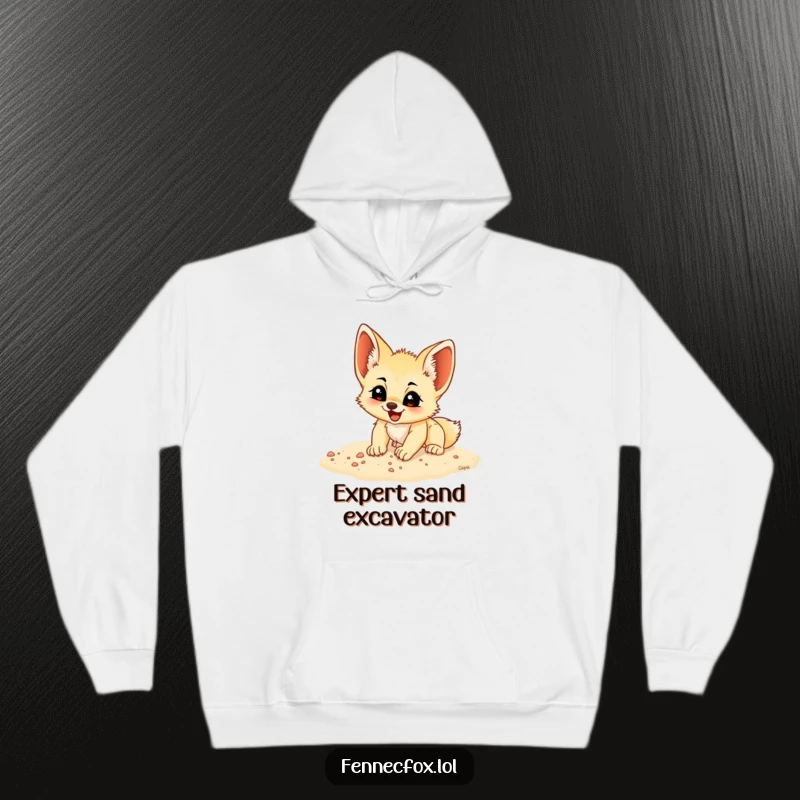 Funny fennec fox cub digging with glee in soft sand, featured on a warm and cozy hoodie, a great funny gift.