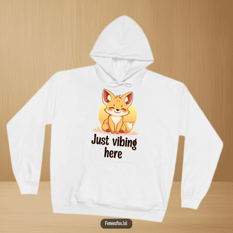 Funny Fennec Fox Hoodie: A content fox basking peacefully in the beautiful glow of a setting sun, a cozy and humorous design.