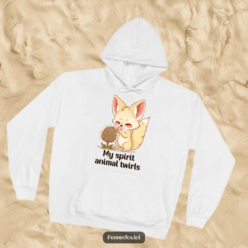 Funny Fennec Fox hoodie featuring a playful fox batting at a tumbleweed, perfect for cozy, humorous wear.