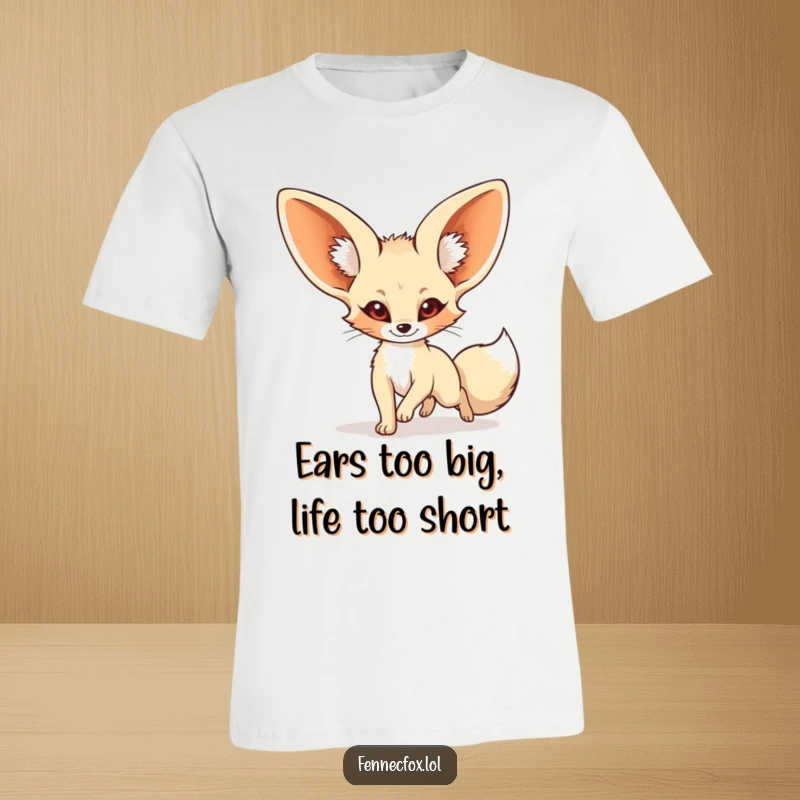 Funny fennec fox t-shirt showcasing a cartoon desert fox with massive ears playfully spinning while chasing its tail.