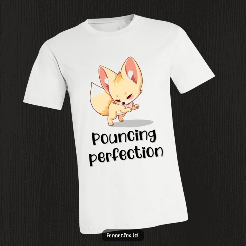 Funny T-Shirt, cute fennec fox mid-pounce, playfully attacking a shadow on the ground, highlighting agility and fun.