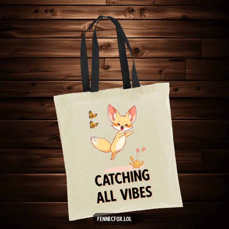 Funny tote bag featuring a fennec fox leaping joyfully into the air, chasing a desert butterfly.