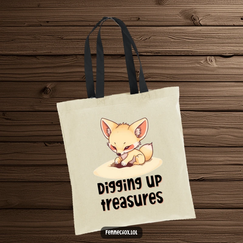 Funny tote bag featuring a fennec fox playfully digging a small, energetic hole in the sand.